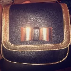 Very loved Elle purse. Black & Gold